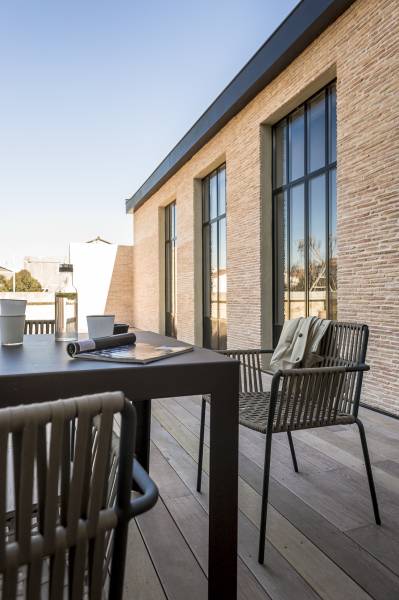 Cabinet d’architecture Hybre Architecte à Bordeaux : briquettes et pierre blonde